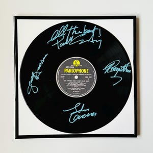 The Beatles Sgt Peppers Signed Vinyl Record With Black Frame