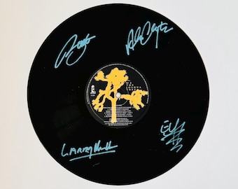 Disco de vinilo firmado sin marco The Joshua Tree de U2
