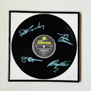 The Beatles Sgt Peppers Signed Vinyl Record With Black Frame