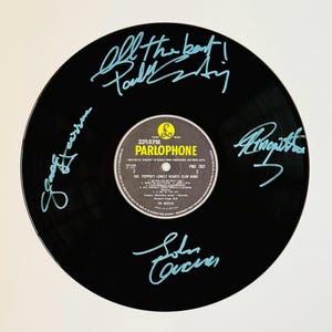 The Beatles Sgt Peppers Signed Vinyl Record Unframed