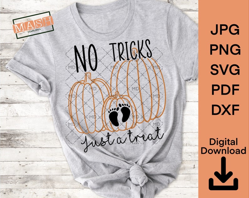 May include: A gray t-shirt with the text "NO TRICKS just a treat" and two orange pumpkins with a pair of baby footprints on one of the pumpkins.