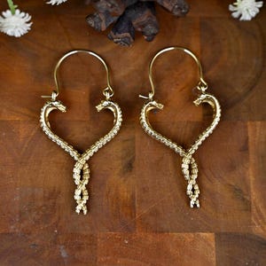 Celestial Snake Hoop Earrings: Brass Double Snake Face