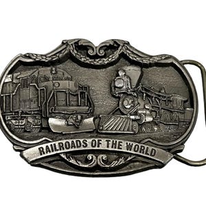 RAILROADS vintage belt buckle Train of the world Made in USA