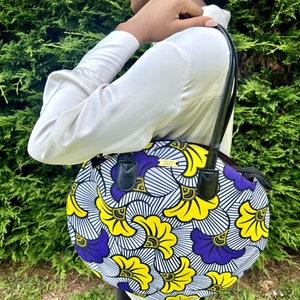 Round tote bag in purple and yellow African wax