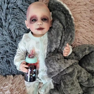 Zombie monster reborn baby doll. Vampire