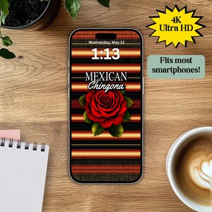 May include: A smartphone mockup with a colorful striped background and a red rose. The screen displays the time "1:13" and the text "MEXICAN Chingona".