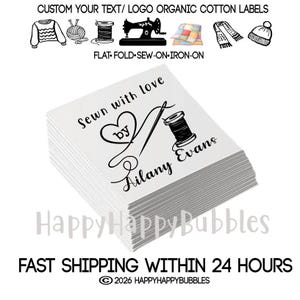 May include: A stack of white organic cotton labels featuring black printed text that reads Sewn with love by Ailany Evans, accompanied by a graphic of a needle, thread, and heart. The top includes icons of clothing and sewing tools.