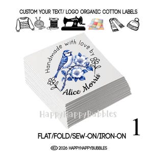 May include: A stack of square organic cotton labels featuring a blue bird perched on a branch with blue flowers. The text reads Handmade with love by Alice Morris. Above are icons of a sweater, yarn, thread, sewing machine, quilt, scarf, and hat.