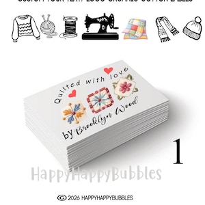 May include: A stack of rectangular organic cotton labels featuring the text Quilted with love by Brooklyn Wood, decorated with red hearts and three colorful quilt block illustrations. The top includes icons of a sweater, yarn, thread, sewing machine, quilt, scarf, and hat.