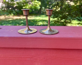 Pair of miniature brass candlesticks