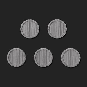 May include: Five grey, circular wooden shields with a metal rim and rivets. The shields have a vertical wood grain pattern. The objects are arranged against a dark grey background.