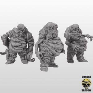 May include: Three gray, grotesque monster figurines with textured, fleshy bodies and tentacle-like appendages. Each figure has a distorted face and stands in a different pose. The Duncan Shadow logo is in the bottom right corner.
