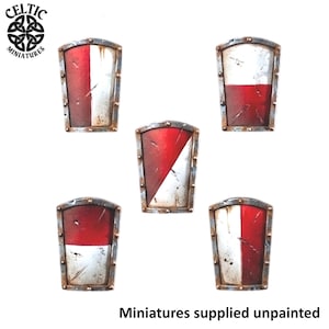 May include: Five miniature shields featuring a red and white colour scheme with metallic, weathered edges. The shields are arranged in a pentagonal pattern, each displaying distinct geometric divisions of red and white paint. Text reads Celtic Miniatures and Miniatures supplied unpainted.