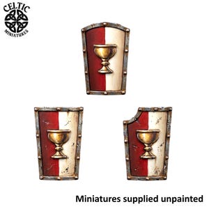 May include: Three miniature shields featuring a vertical split design in red and off-white, each with a central gold-colored chalice emblem. The shields have a metallic-looking border with rivet details, and one shield shows a small notch.