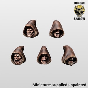 May include: Five miniature heads wearing brown hoods, each featuring distinct facial expressions including scowling, shouting, and bearded faces. The text Duncan Shadow is visible in the top right corner, and the text Miniatures supplied unpainted is at the bottom.