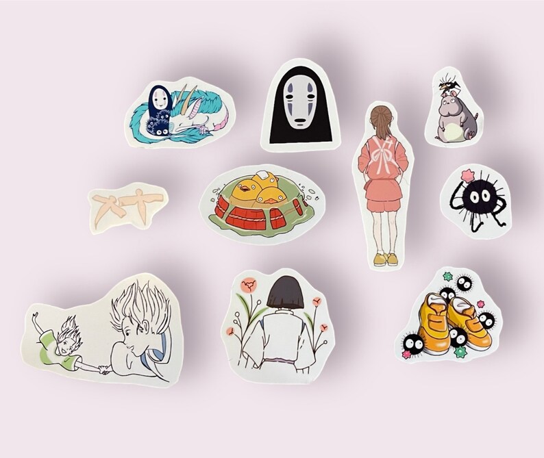 May include: A set of ten stickers featuring characters and imagery from the animated film Spirited Away. The stickers are printed on white paper and feature a variety of colors, including black, white, red, blue, green, and yellow.
