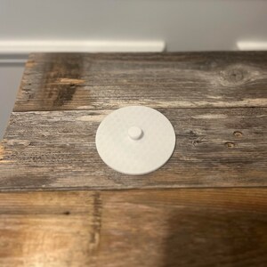 Back of bit has a one piece backing.