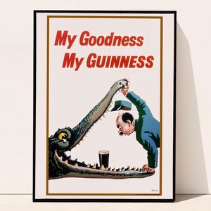 Puede incluir: Un cartel vintage que anuncia la cerveza Guinness. El cartel presenta un cocodrilo de dibujos animados con un hombre colgado de sus fauces abiertas. El texto del cartel dice "My Goodness My GUINNESS".