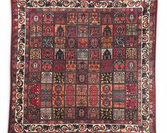 Cushion cover inspired by a traditional Bakhtiar tribe rug design, depicting a Persian garden.