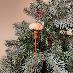 Sea urchin shell ornament.