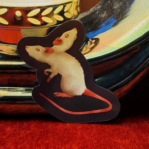 Sticker agneau volant à deux têtes en vinyle esthétique