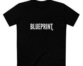 May include: Black t-shirt with the word "BLUEPRINT" in white, accompanied by a small white star. The shirt has short sleeves and a crew neck.