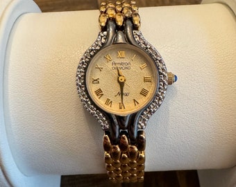 Vintage Two Tone Black & Gold Armitron Diamond Now Ladies Watch
