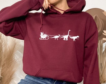 Sudadera con capucha de trineo de dinosaurios, sudadera con capucha de Santa Claus, sudadera con capucha de dinosaurio de Dinosaurio, sudadera con capucha de dinosaurio de Dinosaurio, sudadera con capucha de dinosaurio de Santas