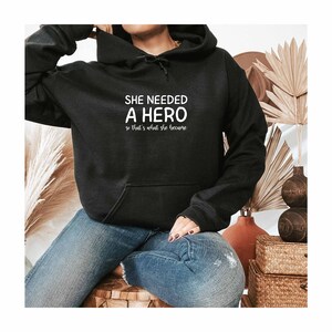 She Needed A Hero Hoodie, Feminist Hoodie, Feminism Hoodie, Rbg Gift, Gift For Activist, Pro Choice Hoodie, Equality Hoodie, Protest Hoodie