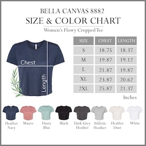 Puede incluir: Tabla de tallas y colores para una camiseta corta y fluida para mujer. La tabla muestra la talla, la medida del pecho en pulgadas y la medida de la longitud en pulgadas. La camiseta est&aacute; disponible en 10 colores: Heather Navy, Mauve, Dusty Blue, Black, Dark Grey Heather, Athletic Heather, Heather Dust, White y dos tonos de Heather.