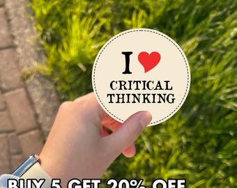May include: A round sticker with the text "I ❤️ CRITICAL THINKING" in black and red. The sticker is held in front of a background of green grass. The text "BUY 5 GET 20% OFF" is at the bottom.