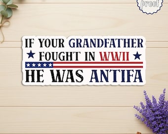 May include: A waterproof sticker with the text "IF YOUR GRANDFATHER ★ FOUGHT IN WWII ★ HE WAS ANTIFA" in blue, white, and red. The sticker is on a light wood grain surface, with a sprig of lavender and cinnamon sticks in the background.