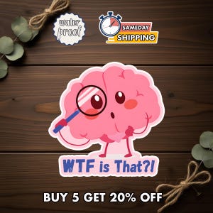 May include: A pink brain character sticker with a white border, holding a magnifying glass to its eye. The text below reads "WTF is That?!" in blue letters. The design features a cartoon style with a surprised expression and thin limbs.