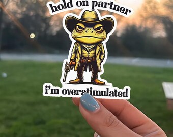 Hold On Partner I’m Overstimulated Sticker, Funny Cowboy Frog Sticker, Cute Western Frog Decal, Introvert Humor Gift, Laptop Sticker
