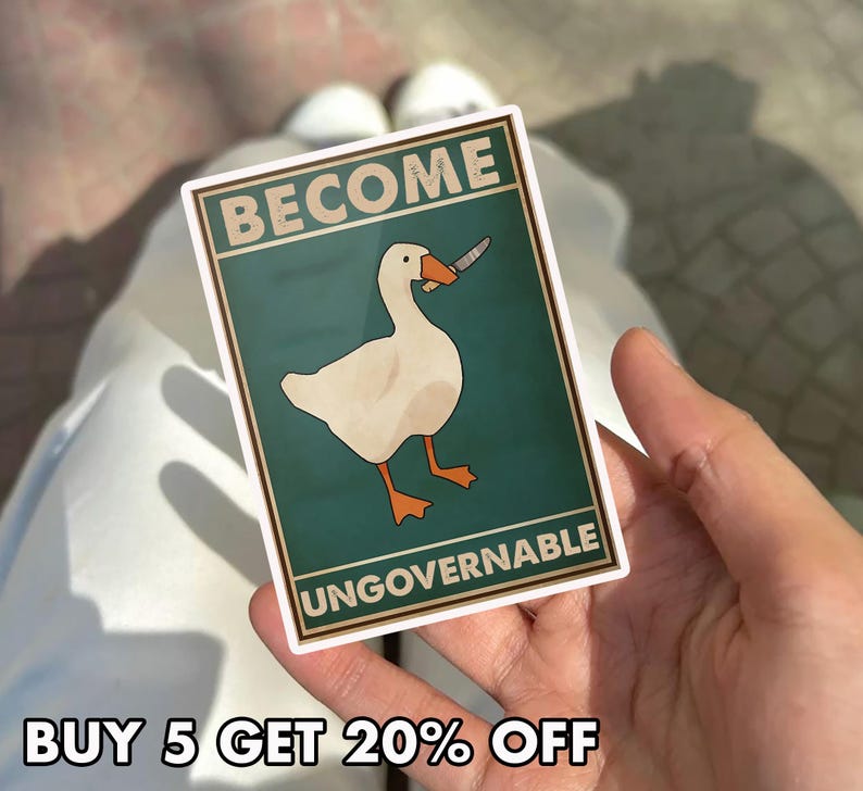 May include: A rectangular sticker featuring a white goose with an orange beak and feet, holding a knife in its beak. The sticker has the words "BECOME UNGOVERNABLE" and "BUY 5 GET 20% OFF" in a bold font.