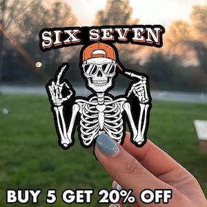 May include: A sticker featuring a skeleton wearing sunglasses and an orange cap, with the text "SIX SEVEN" above. The skeleton is giving the "okay" sign with one hand and pointing with the other. The text "BUY 5 GET 20% OFF" is at the bottom.