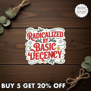 May include: A white sticker with the text "RADICALIZED BY BASIC DECENCY" in red, green, and white. The sticker has a Christmas theme with snowflakes, holly, and a Santa hat. The sticker is labeled "water proof".