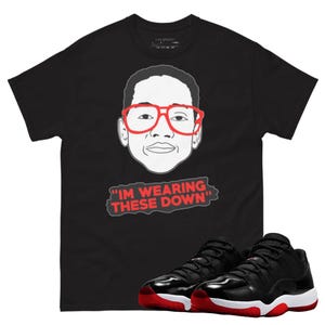 Jordan 11 low bred wearing these down black t-shirt