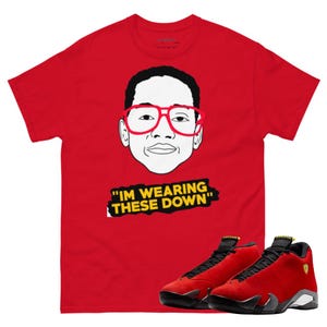 Jordan 14 Ferrari wearing downs red tee