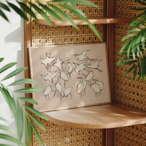 This vintage Japanese art print features a flock of egret birds rendered in bold, abstract brushstrokes, against an understated tan background.  A captivating addition to both traditional and modern interiors. Instantly download, print, and frame!