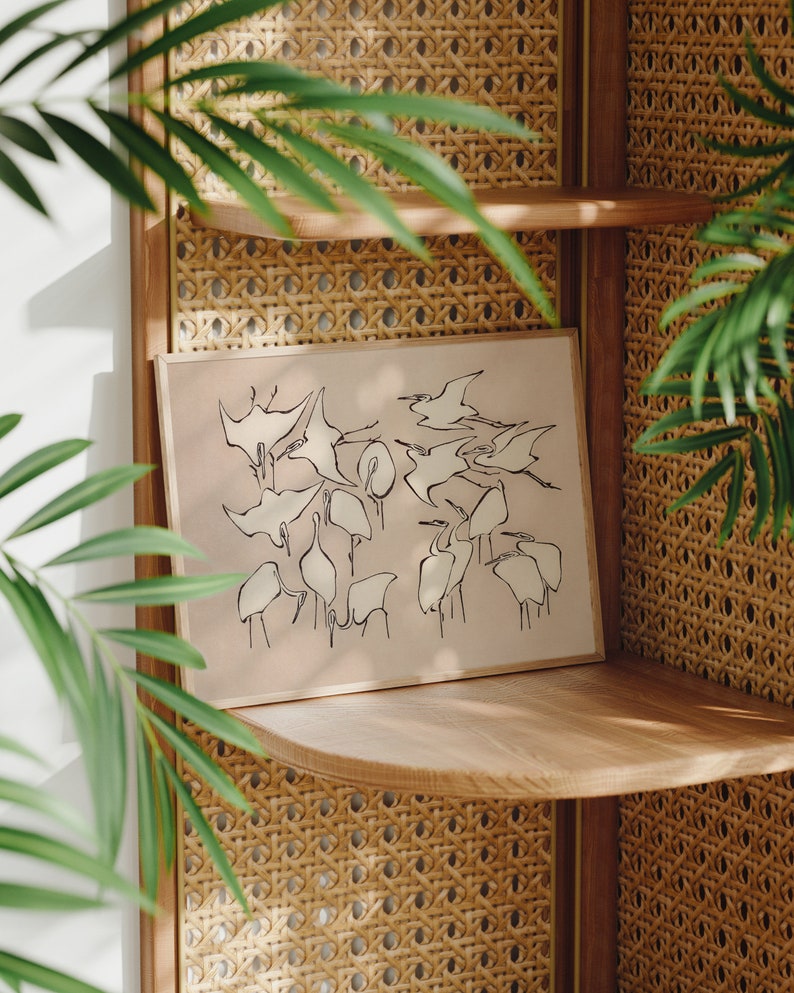 This vintage Japanese art print features a flock of egret birds rendered in bold, abstract brushstrokes, against an understated tan background.  A captivating addition to both traditional and modern interiors. Instantly download, print, and frame!