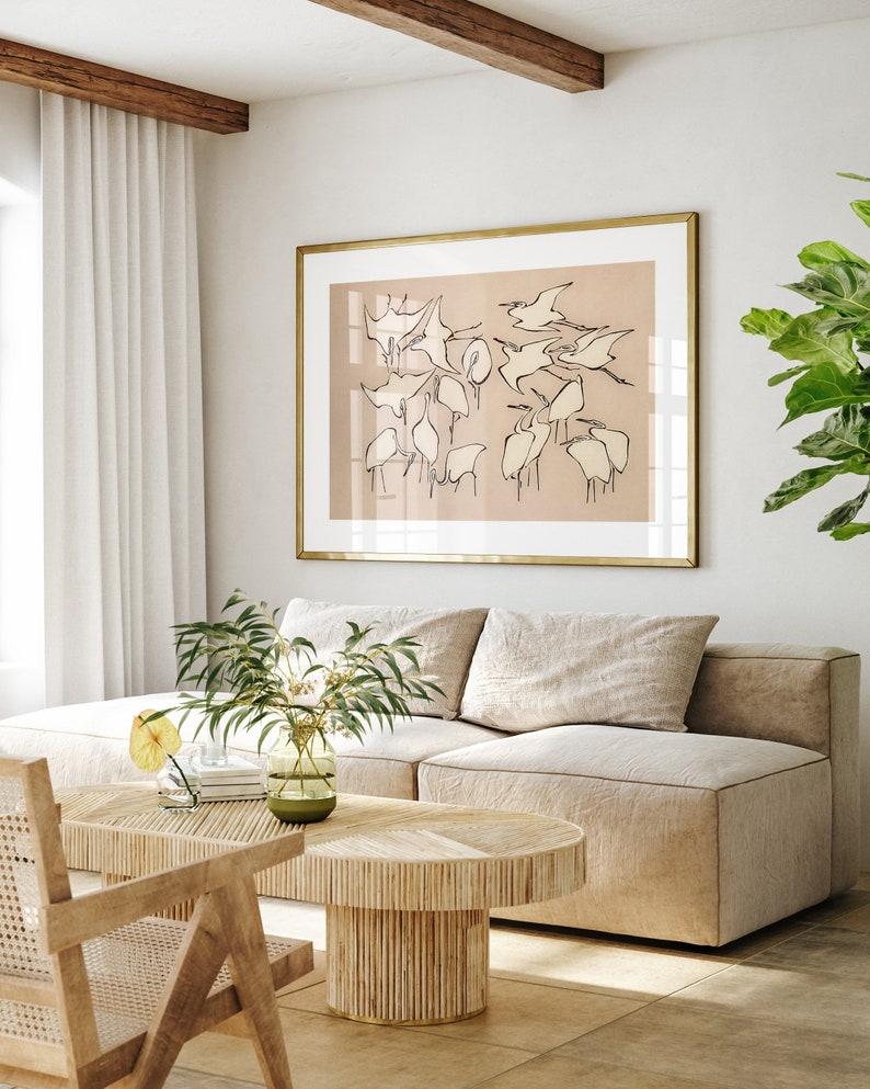 This vintage Japanese art print features a flock of egret birds rendered in bold, abstract brushstrokes, against an understated tan background.  A captivating addition to both traditional and modern interiors. Instantly download, print, and frame!