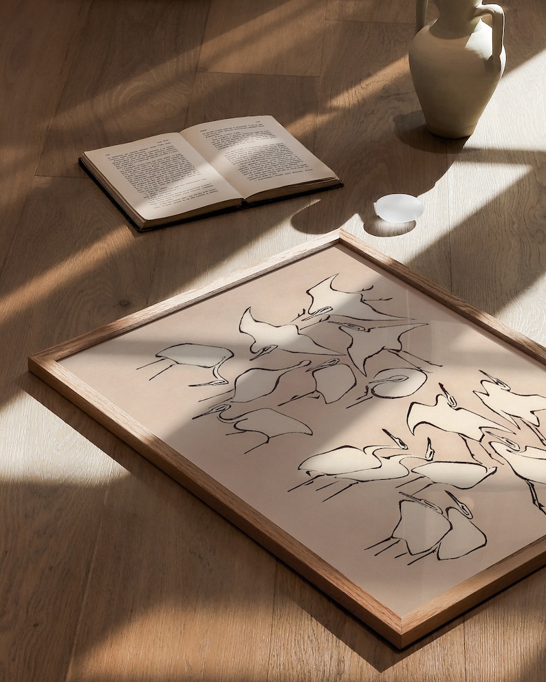 This vintage Japanese art print features a flock of egret birds rendered in bold, abstract brushstrokes, against an understated tan background.  A captivating addition to both traditional and modern interiors. Instantly download, print, and frame!