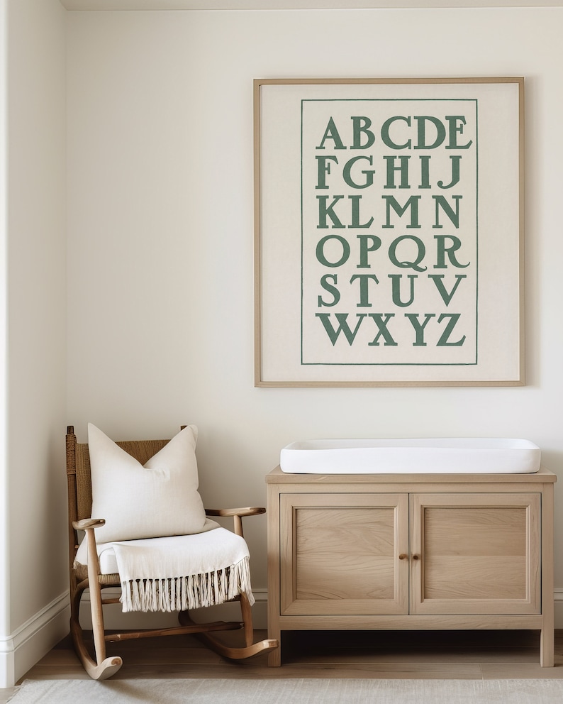 Charming vintage letter artwork featuring and hand drawn alphabet in prominent capitals. This beautiful sage green ABC poster print is perfect for nursery or playroom decor. Instantly download, print, and frame!