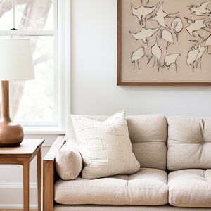 This vintage Japanese art print features a flock of egret birds rendered in bold, abstract brushstrokes, against an understated tan background.  A captivating addition to both traditional and modern interiors. Instantly download, print, and frame!