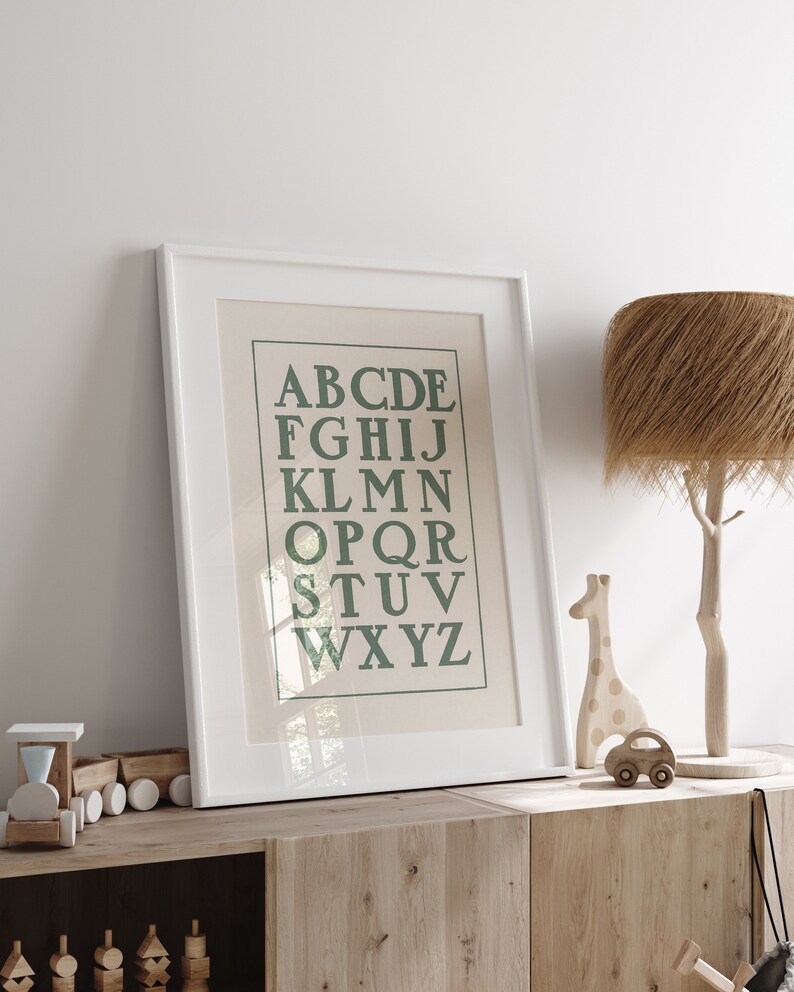 Charming vintage letter artwork featuring and hand drawn alphabet in prominent capitals. This beautiful sage green ABC poster print is perfect for nursery or playroom decor. Instantly download, print, and frame!