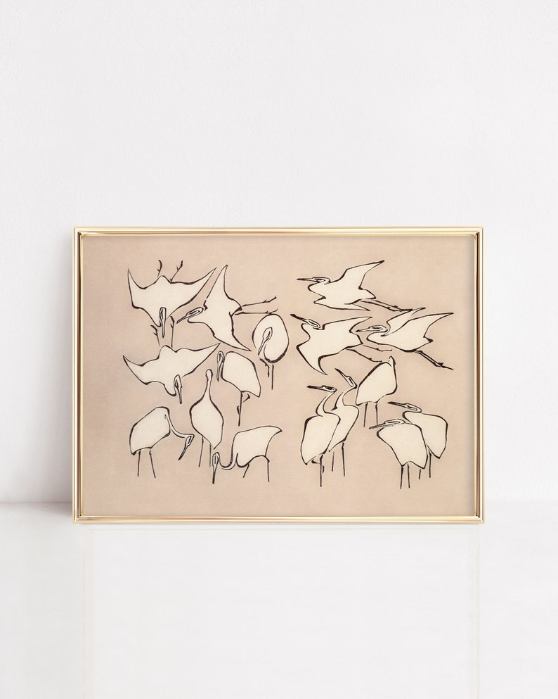 This vintage Japanese art print features a flock of egret birds rendered in bold, abstract brushstrokes, against an understated tan background.  A captivating addition to both traditional and modern interiors. Instantly download, print, and frame!