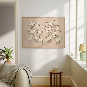 This vintage Japanese art print features a flock of egret birds rendered in bold, abstract brushstrokes, against an understated tan background.  A captivating addition to both traditional and modern interiors. Instantly download, print, and frame!