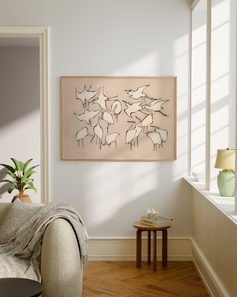 This vintage Japanese art print features a flock of egret birds rendered in bold, abstract brushstrokes, against an understated tan background.  A captivating addition to both traditional and modern interiors. Instantly download, print, and frame!