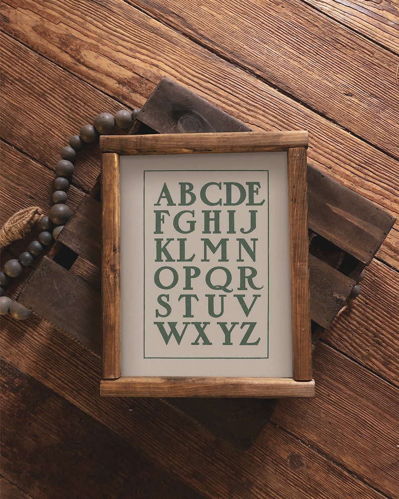 Charming vintage letter artwork featuring and hand drawn alphabet in prominent capitals. This beautiful sage green ABC poster print is perfect for nursery or playroom decor. Instantly download, print, and frame!
